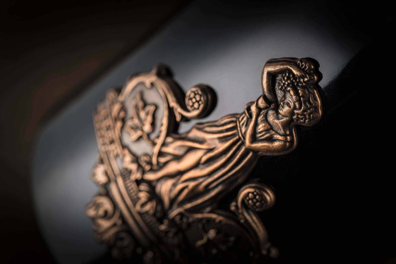 Image of the sculpting featured on Iter Wine's die-cast metal badge by Signet